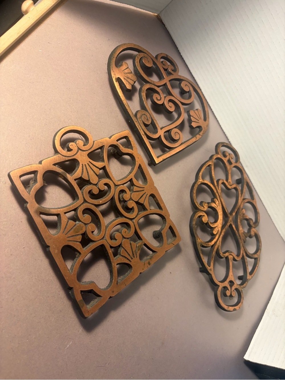 Pampered Chef Copper-Tone Decorative Cast Iron Trivets Set